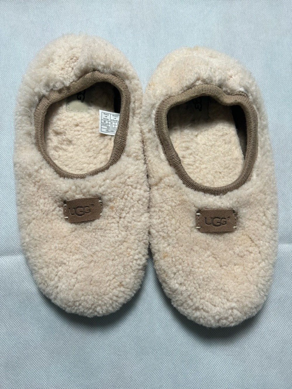 UGG cream and brown fluffy slippers size 9
